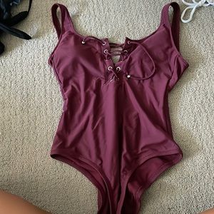 One peice maroon bathing suit